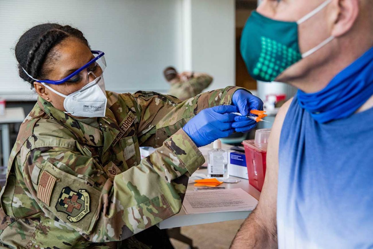 person getting vaccine