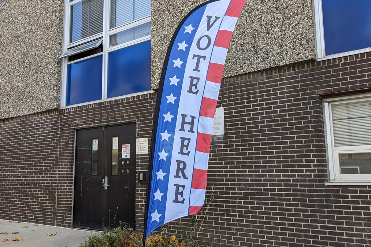 sign that says vote here