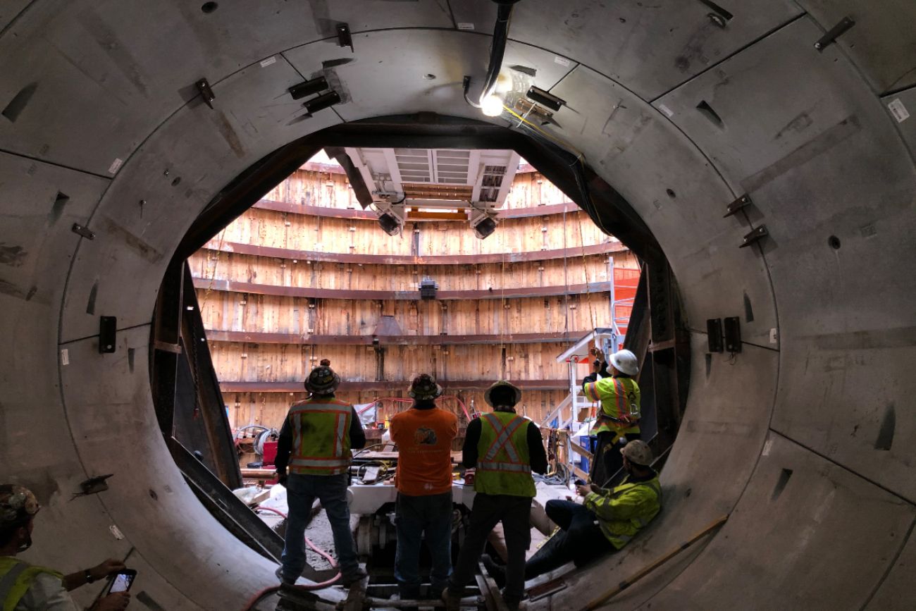 Men in tunnel