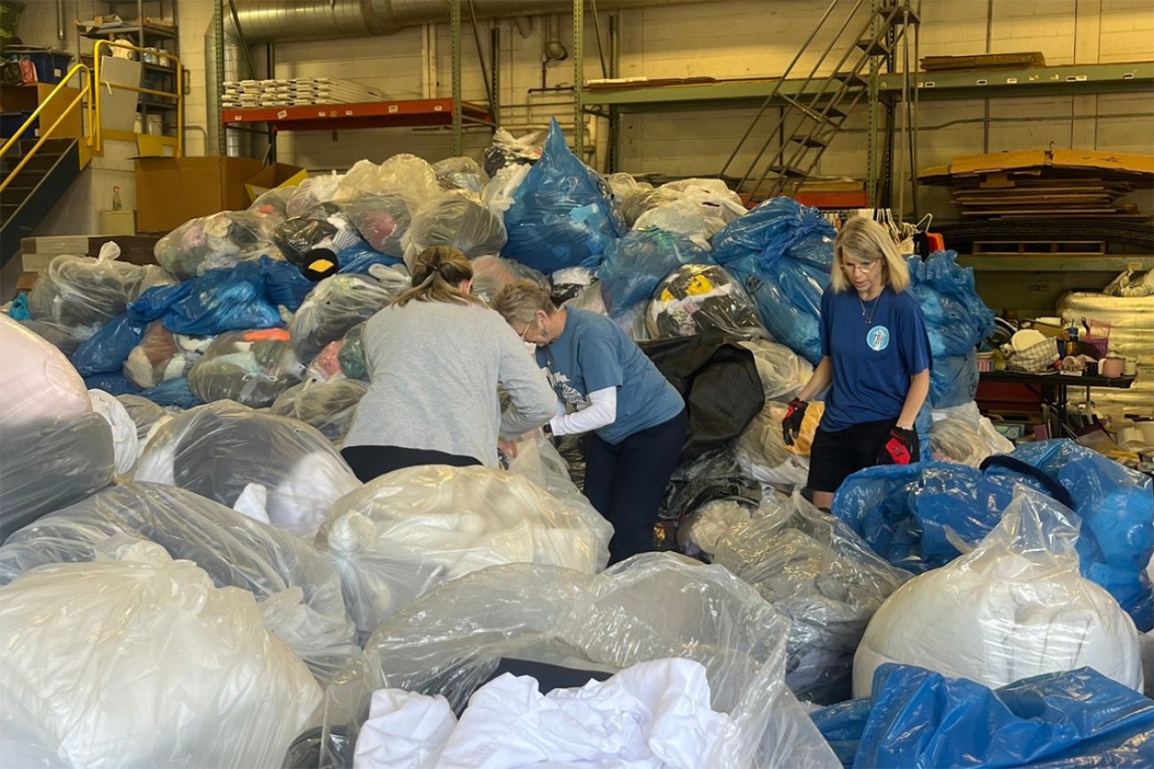a bunch of trash bags in a warehouse