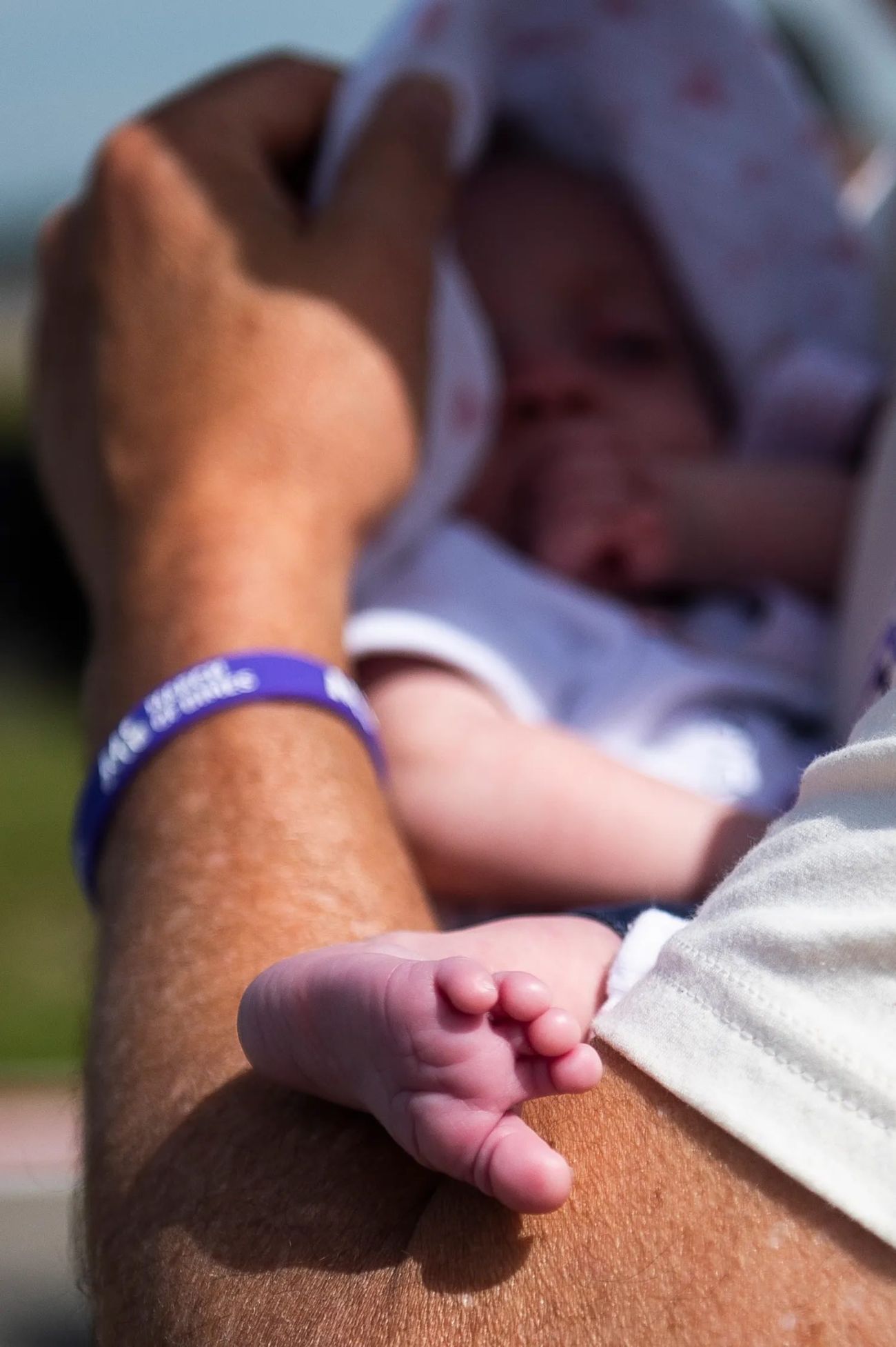 A man holding a baby