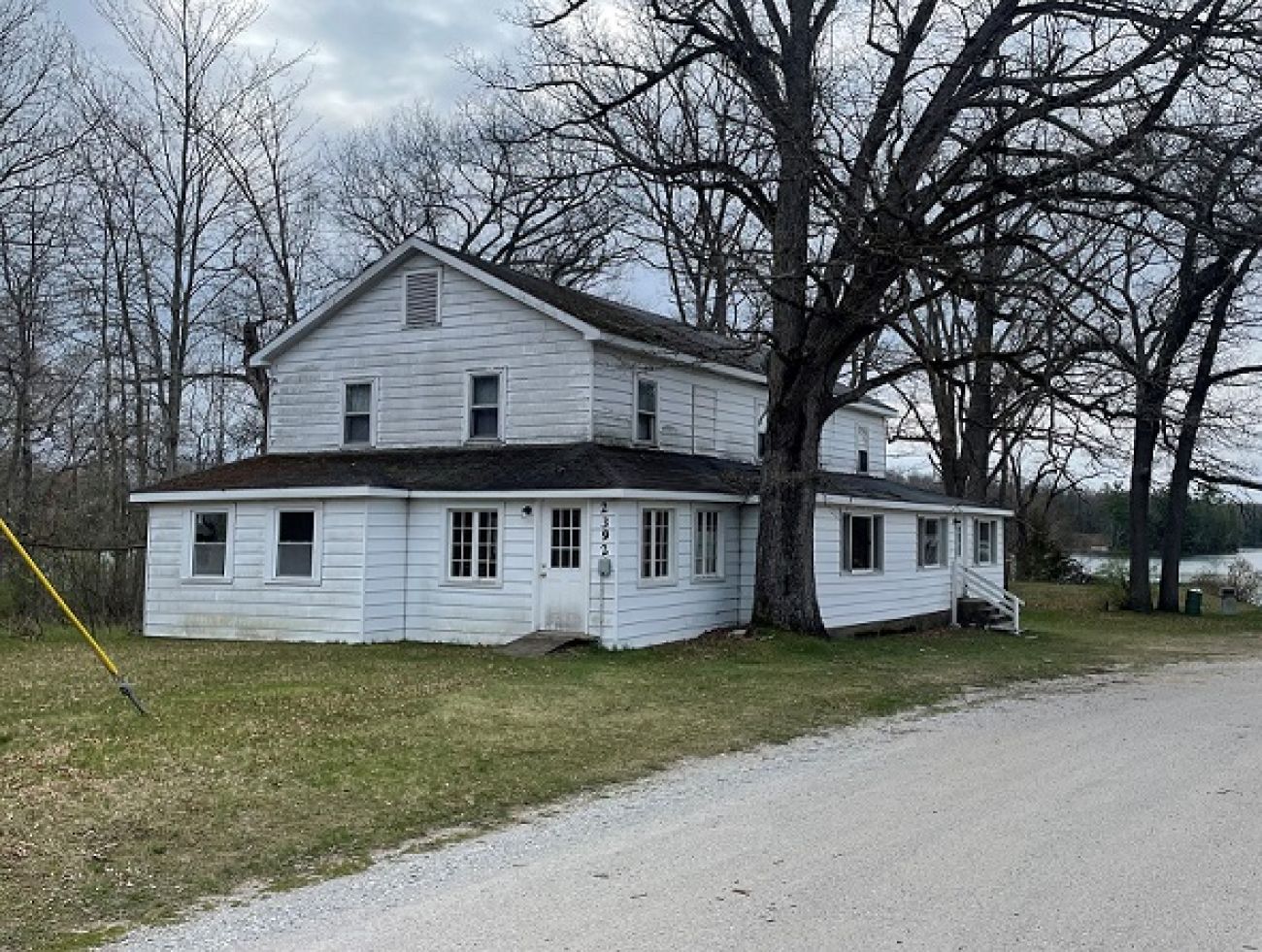 a two-story white building