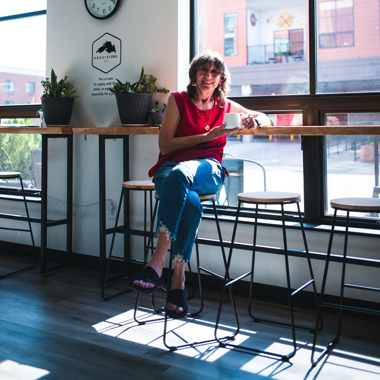 Judy Krause sitting at a chair