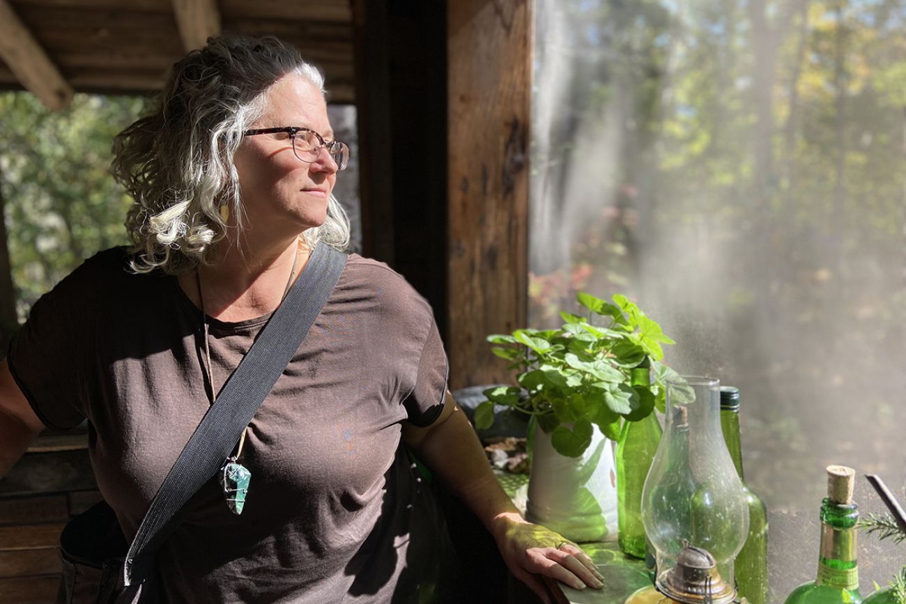 Kathleen Heideman standing next to a window