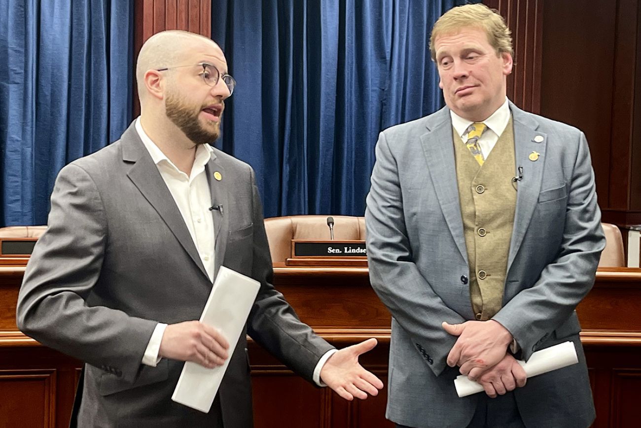 State Sen. Jeremy Moss and Sen. Ed McBroom standing next to each other