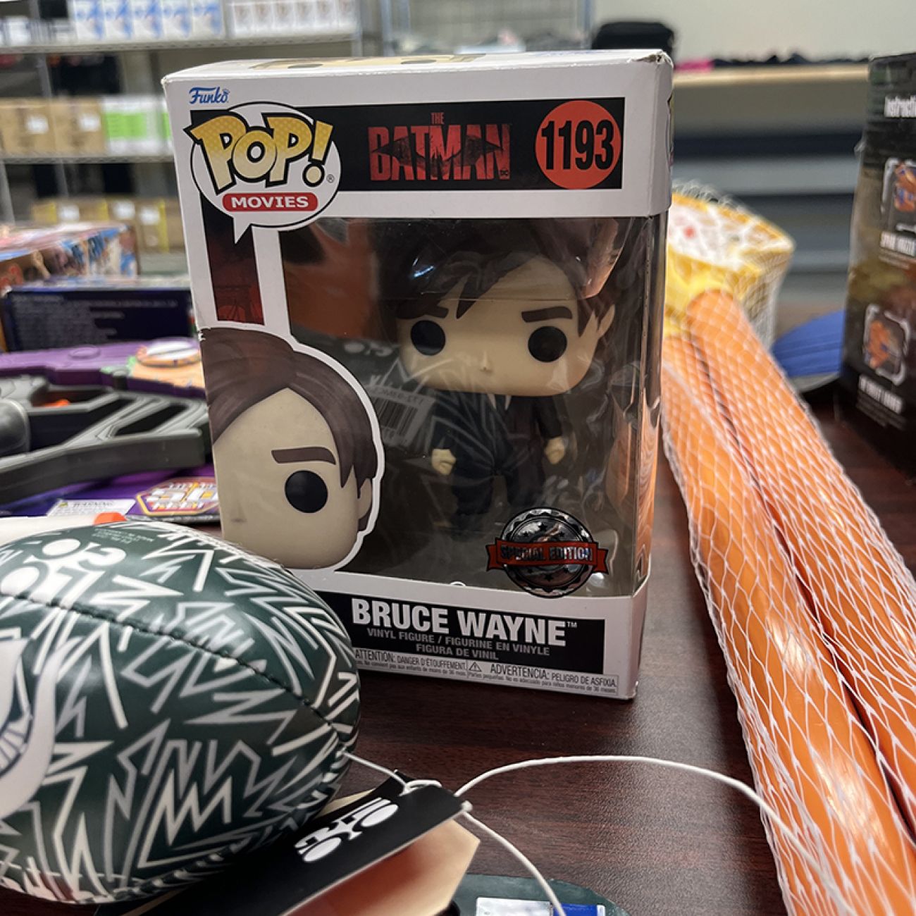 Funko Pop Bruce Wayne on a table