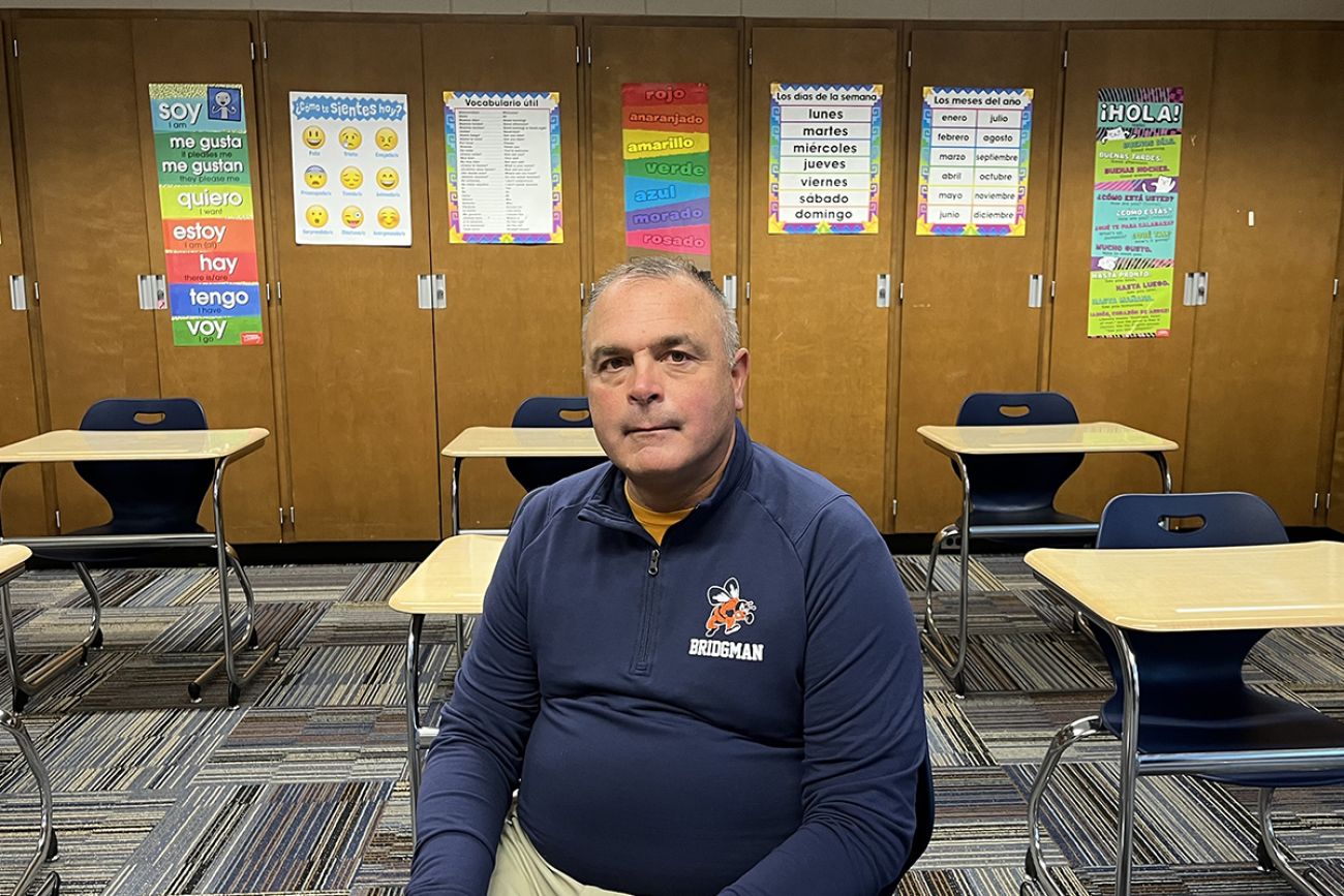 Bridgman Public Schools Superintendent Shane Peters sitting a classroom