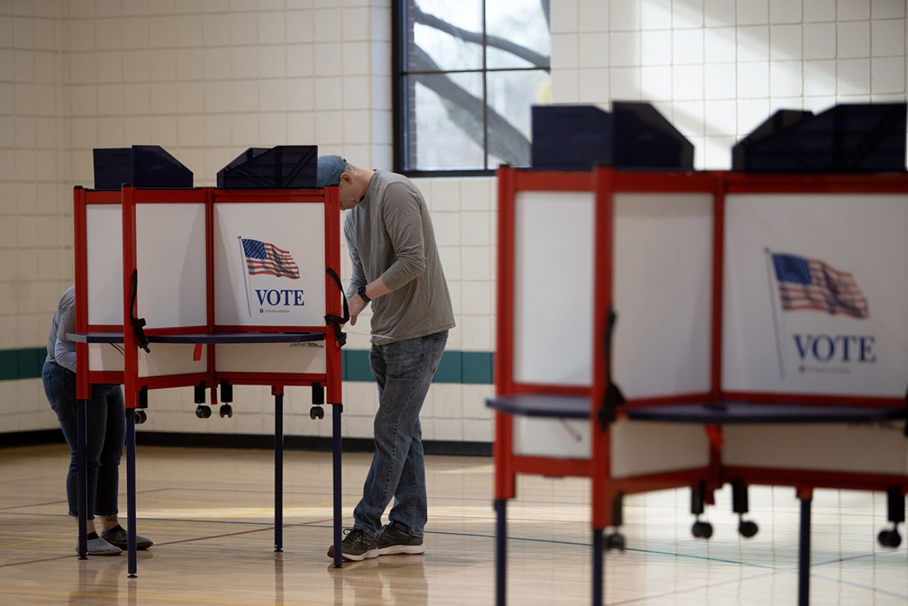 People at the voting booths