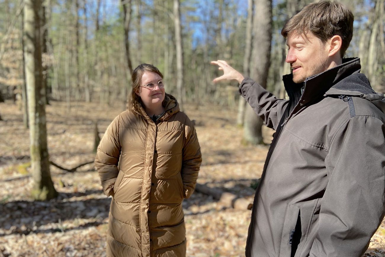 Annica and Peter Quakenbush outside in the woods. 