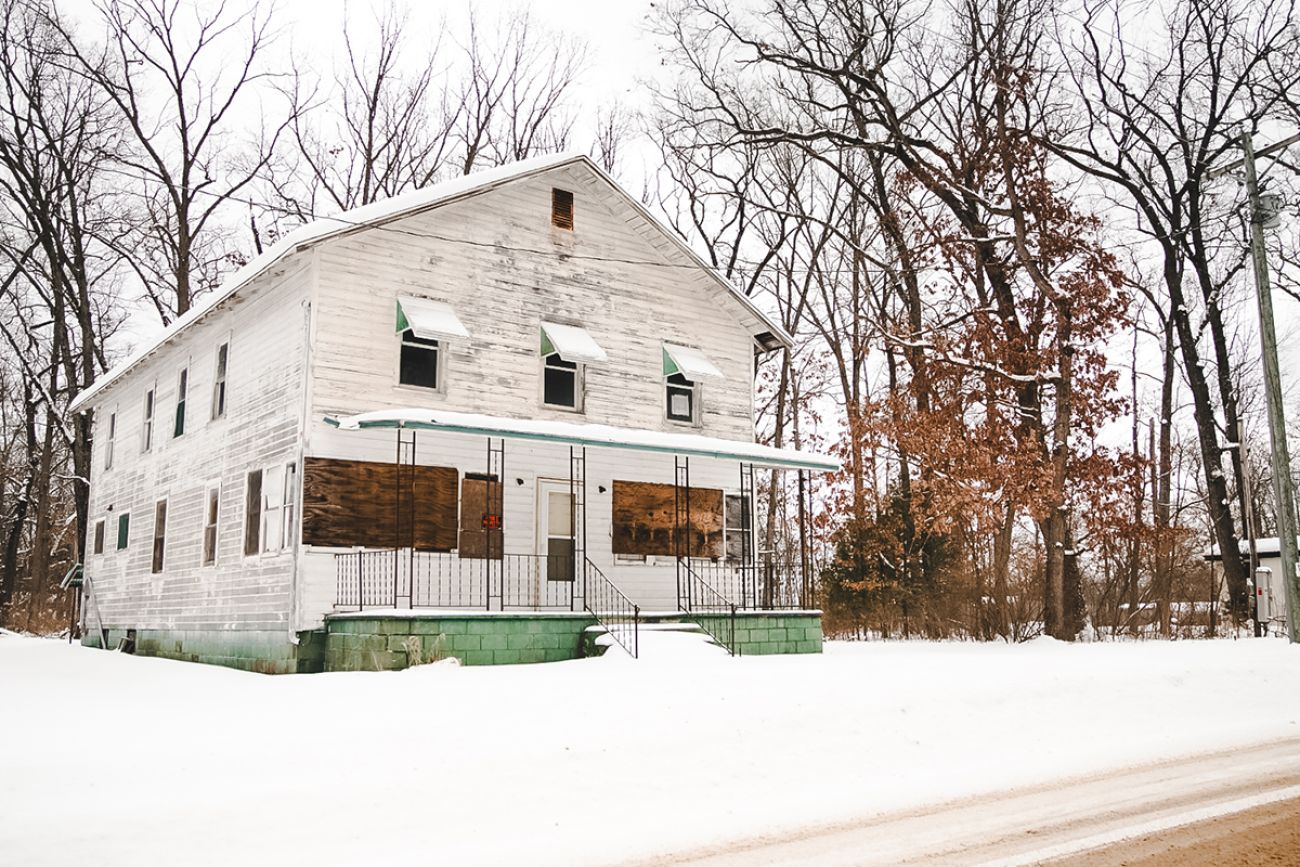 A white building that was once the Oh Dear’s hotel in Michigan. 