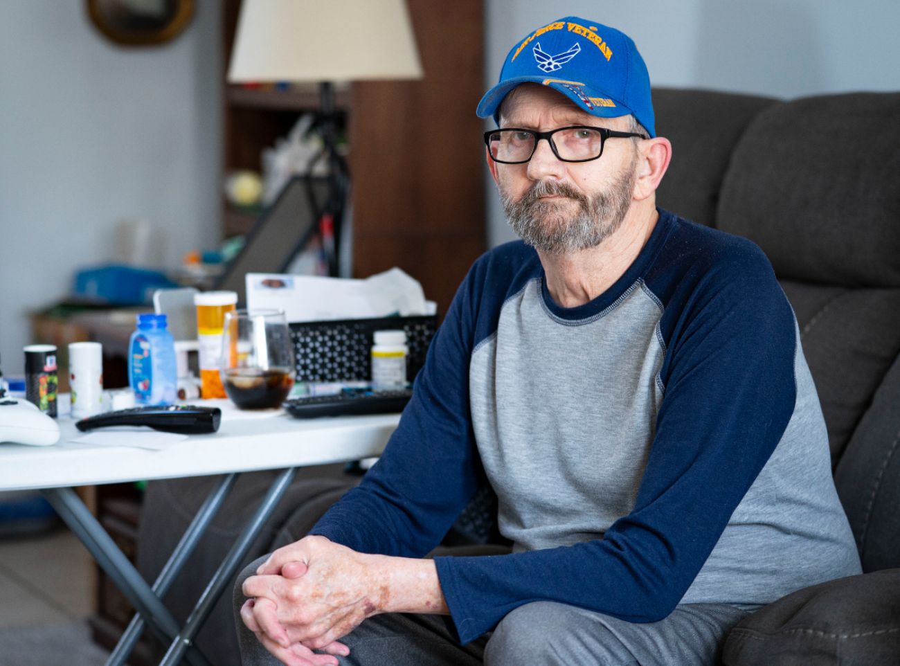 Jim Stiver sitting in a chair. 