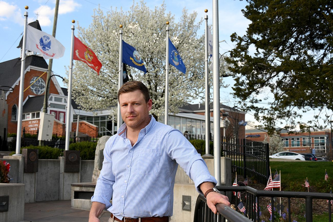 Andrew Lennox poses for a picture outside.