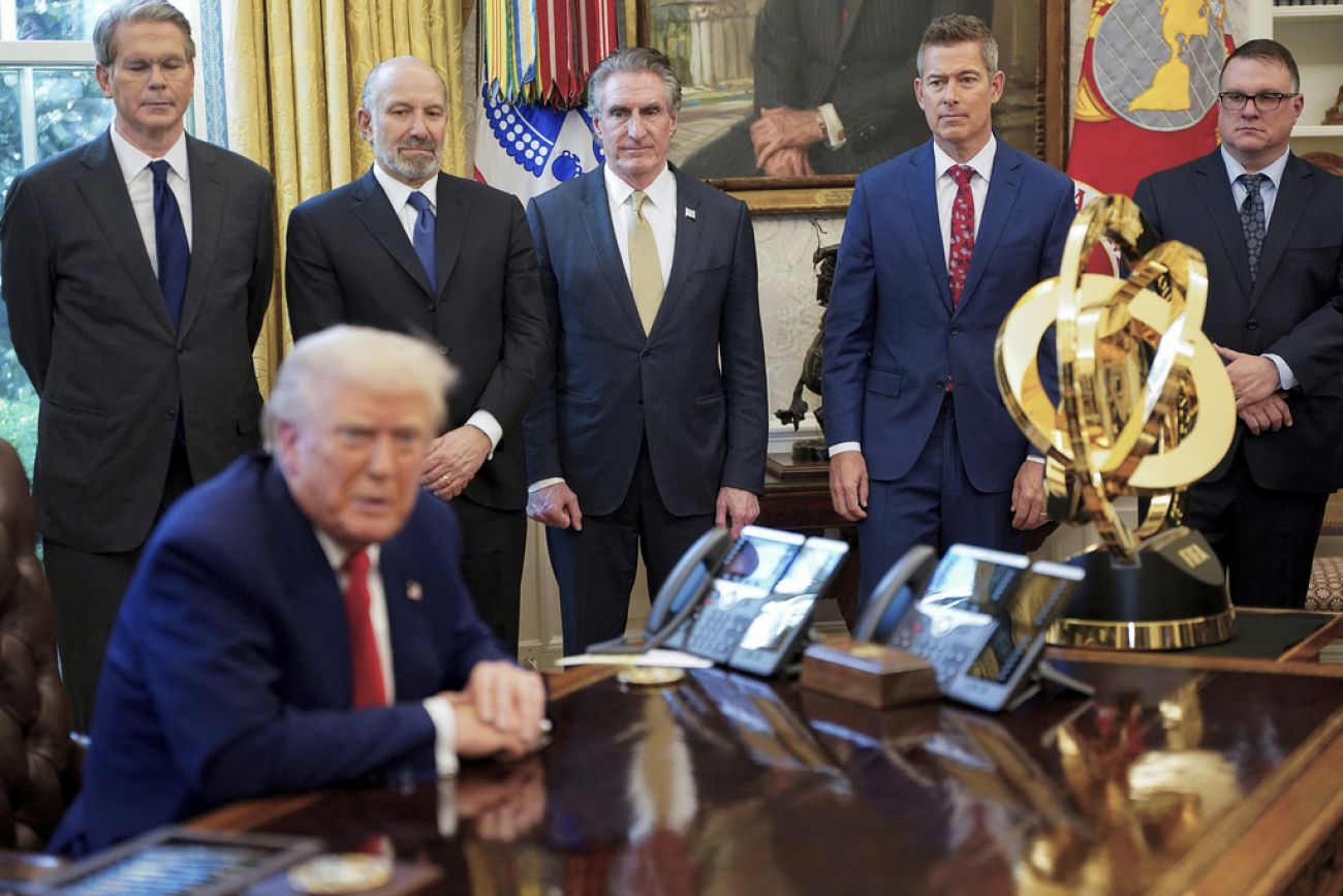 Michigan House Speaker Matt Hall and others are in the Oval Office.