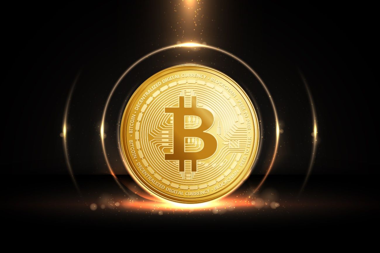 An image illustration showing a Bitcoin against a dark background
