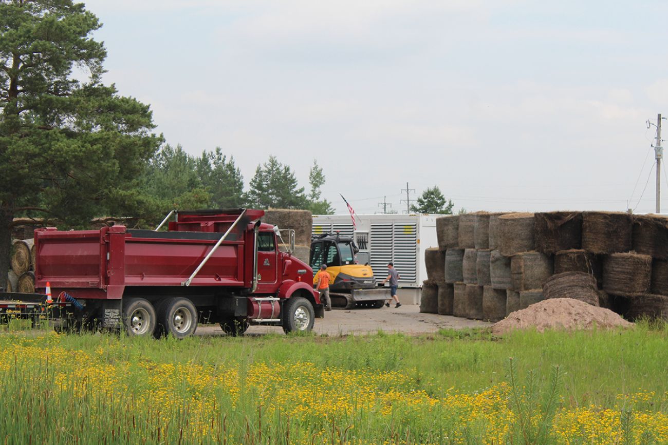 Trucks at a work site in Dafter Township, Michigan.