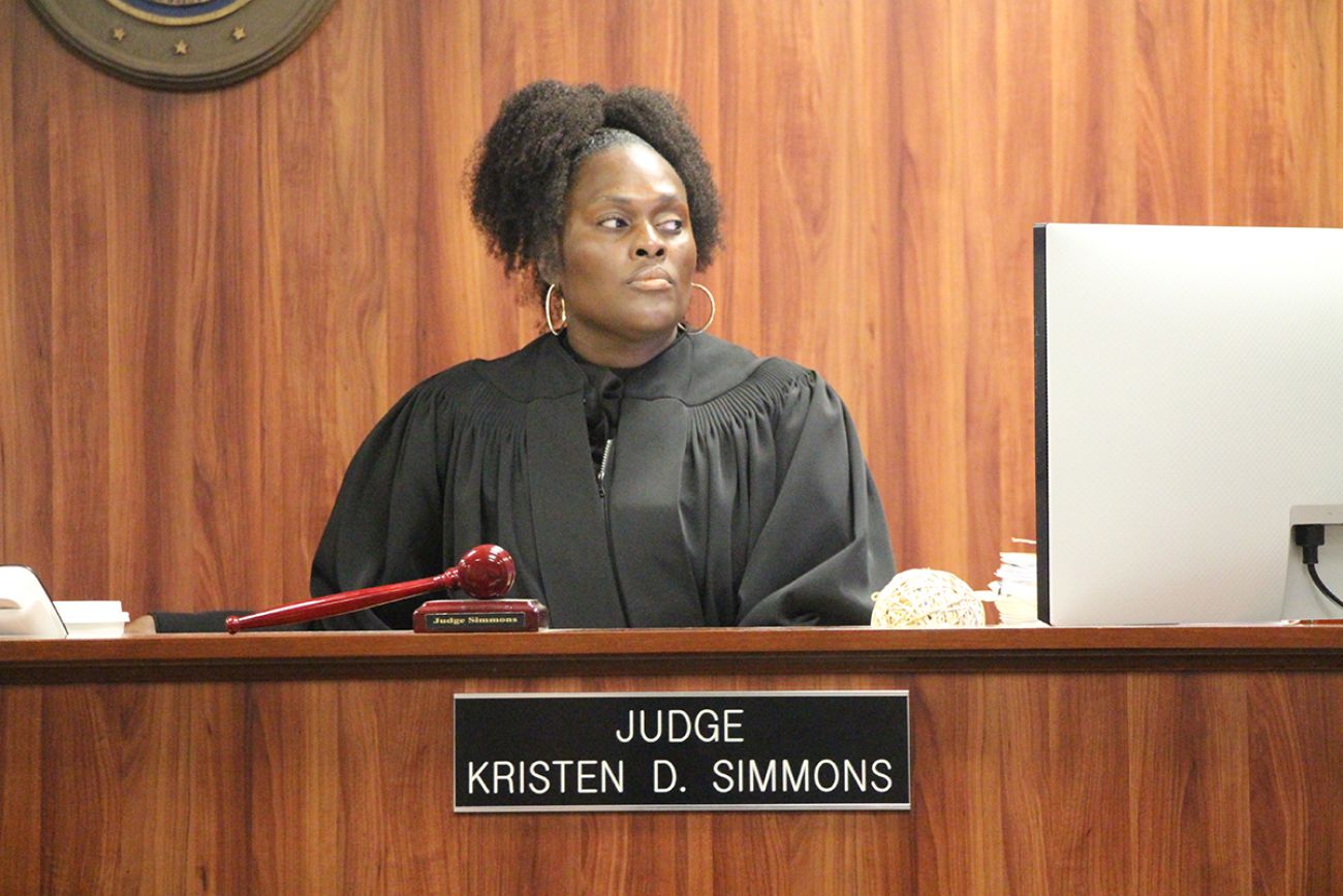Kristin Simmons behind the bench.