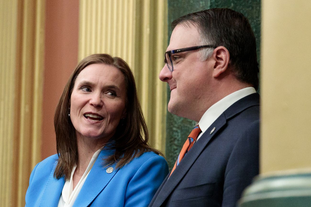 Michigan Senate Majority Leader Winnie Brinks, D-Grand Rapids, talks to House Speaker Matt Hall, R-Richland Township.