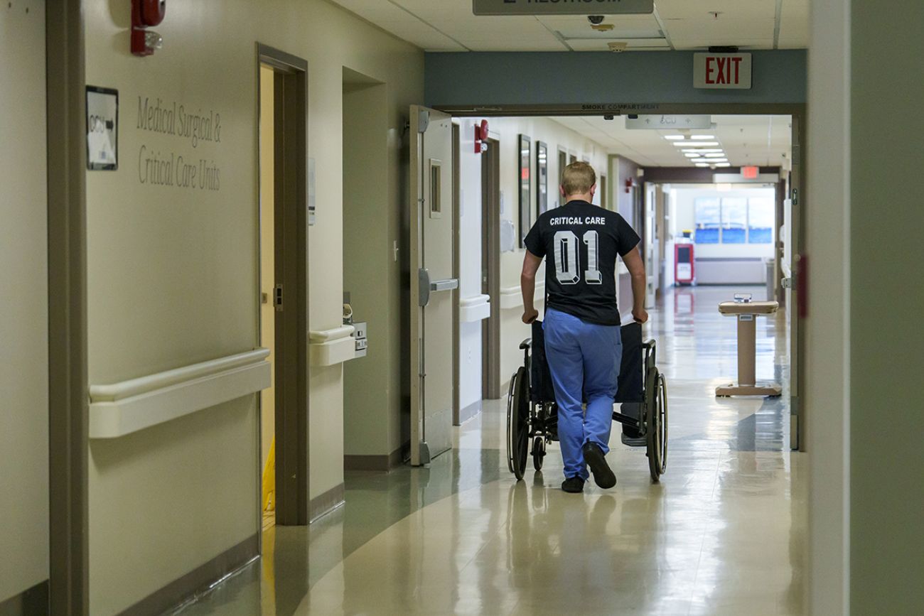 Someone pushes a wheelchair in Hillsdale Hospital in Michigan.