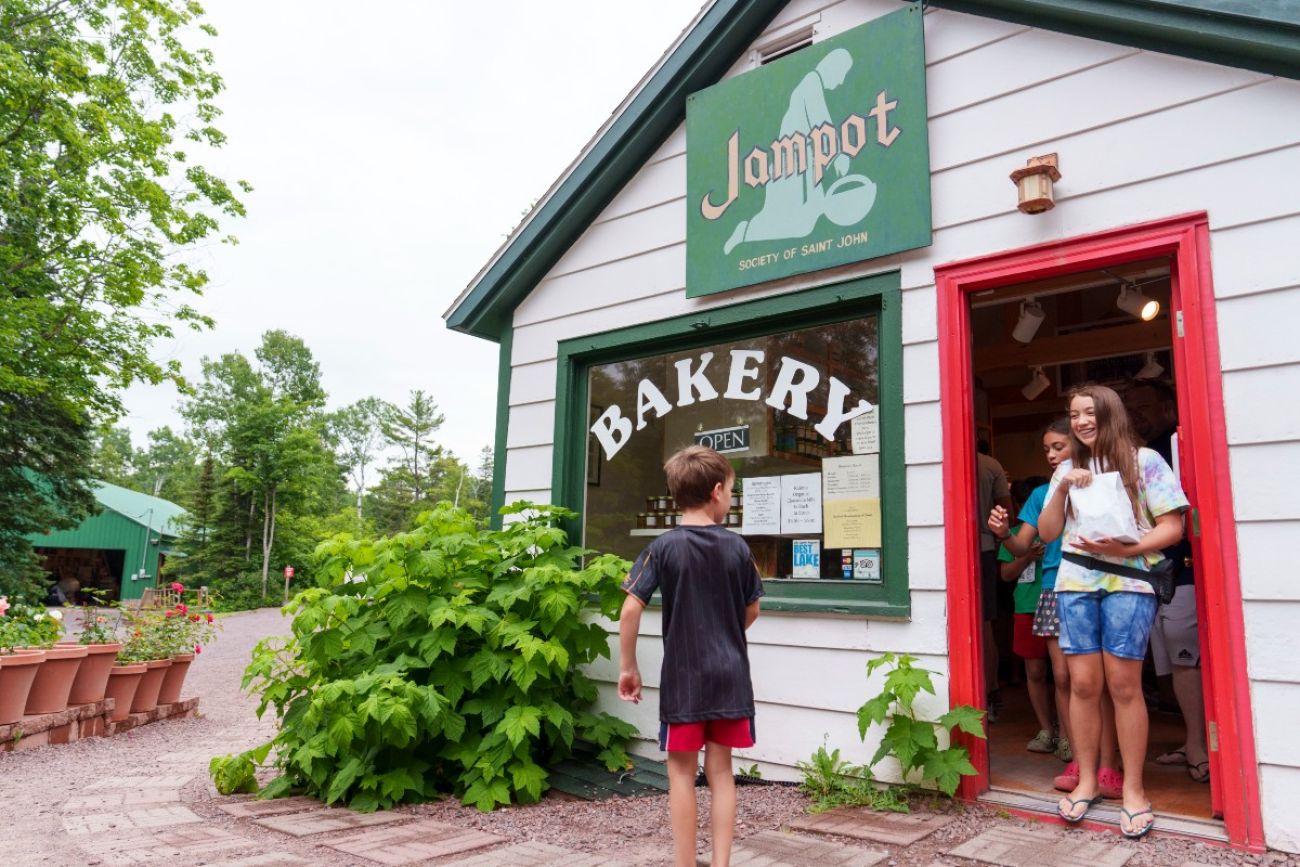 Customers walk out of the Jampot bakery with goodies in hand