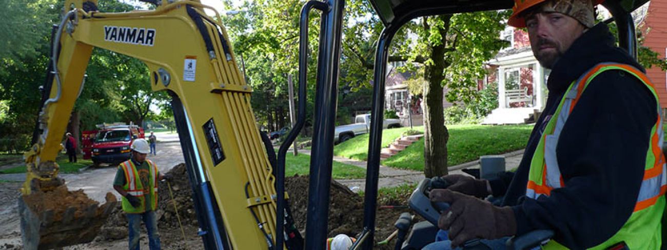 Jerry Dalrymple digging a hole with an excavator