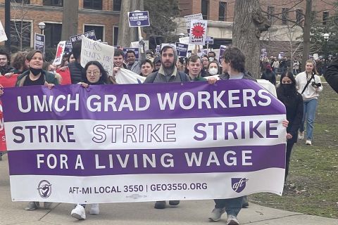 university of michigan grad students marching