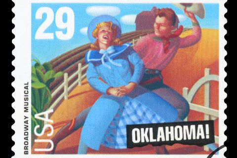 A stamp printed by United States of America, shows heroes of musical "Oklahoma", circa 1993