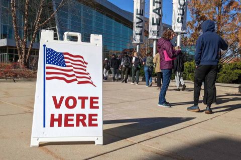 signs that says vote here