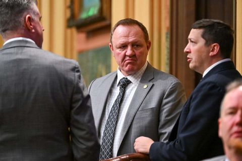 State Rep. Neil Friske talking to other lawmakers