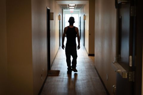 Man stands in hallway