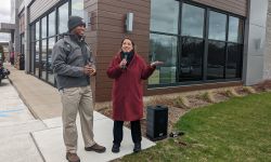 John James and Ronna Romney McDaniel outside