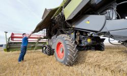 man working on tractor