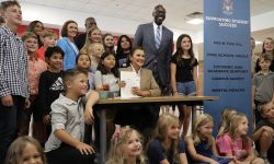 Gov. Gretchen Whitmer surrounded by children