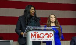 Michigan Republican Party Chair Kristina Karamo speaking into a microphone