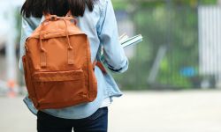 student with a backpack