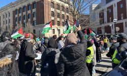 students holding palestine flags