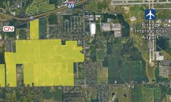 A shot of an aerial map. In yellow shows where Flint-area megasite is expected to built