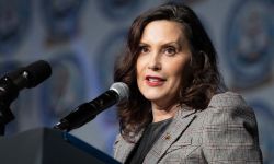 Gov. Gretchen Whitmer speaks into the microphone