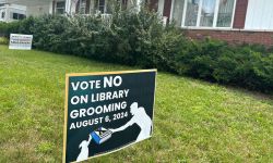 A sign that says "Vote No on Library Grooming" 