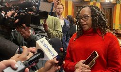 State Rep. Karen Whitsett, D-Detroit, talking to reporters 