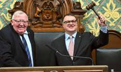 Michigan House Speaker Matt Hall, R-Richland Township, holding up a gavel 