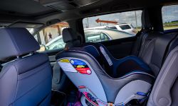 Rear facing infant car seat in a van. 