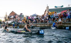 Canoers race down the Au Sable River
