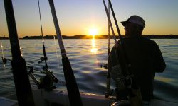 A man fishing on Lake Michigan. 