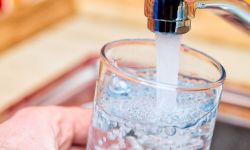 Water comes out of the sink.