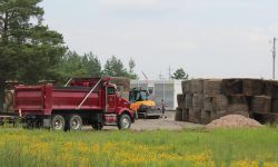 Trucks at a work site in Dafter Township, Michigan.