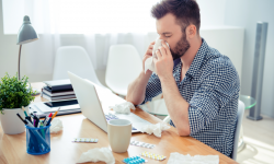 Sick worker in office