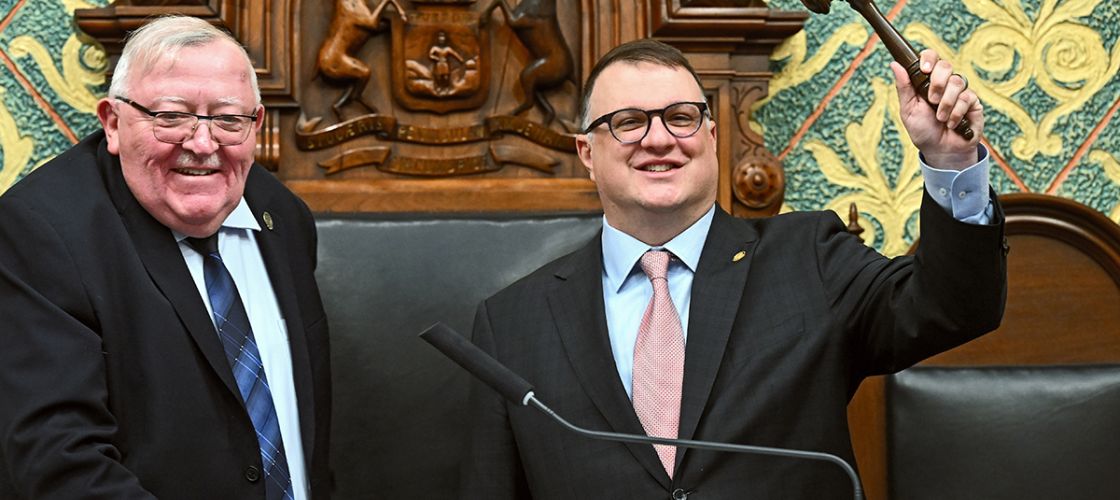 Michigan House Speaker Matt Hall, R-Richland Township, holding up a gavel 