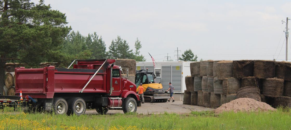 Trucks at a work site in Dafter Township, Michigan.